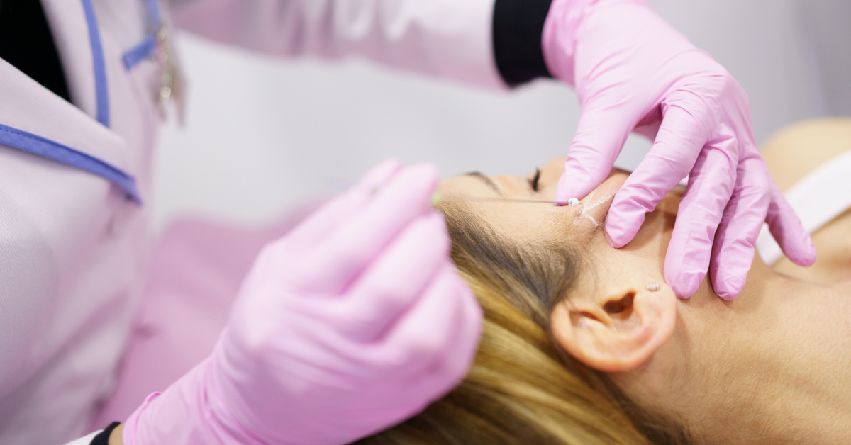 Doctor Injecting PDO Suture Threads Into Woman's Face